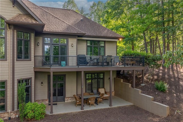 104 Sweetshrub Way, Sunset, SC 29685 - back of house with a patio area, a shingled roof, stone siding, and a deck