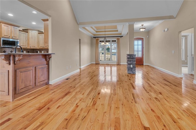114 Royal Troon, Campobello, SC 29322 - living area with baseboards, light wood-style floors, and crown molding
