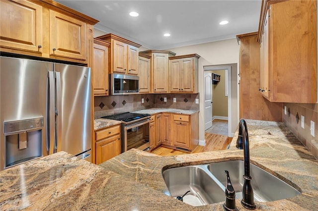 114 Royal Troon, Campobello, SC 29322 - kitchen featuring backsplash, light stone countertops, recessed lighting, appliances with stainless steel finishes, and a sink