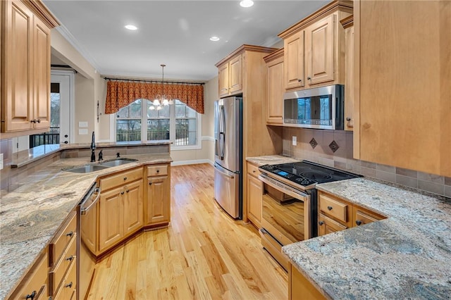 114 Royal Troon, Campobello, SC 29322 - kitchen with a sink, light stone counters, and appliances with stainless steel finishes