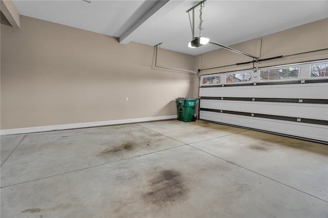 114 Royal Troon, Campobello, SC 29322 - garage featuring baseboards and a garage door opener