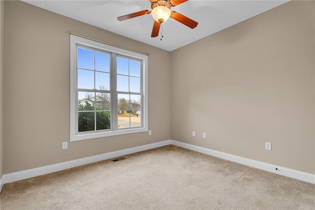 114 Royal Troon, Campobello, SC 29322 - spare room with ceiling fan, baseboards, visible vents, and light carpet