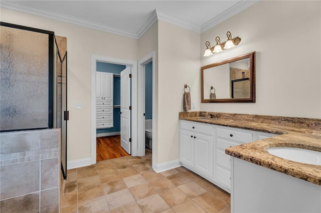 114 Royal Troon, Campobello, SC 29322 - full bathroom featuring vanity, baseboards, an enclosed shower, crown molding, and toilet