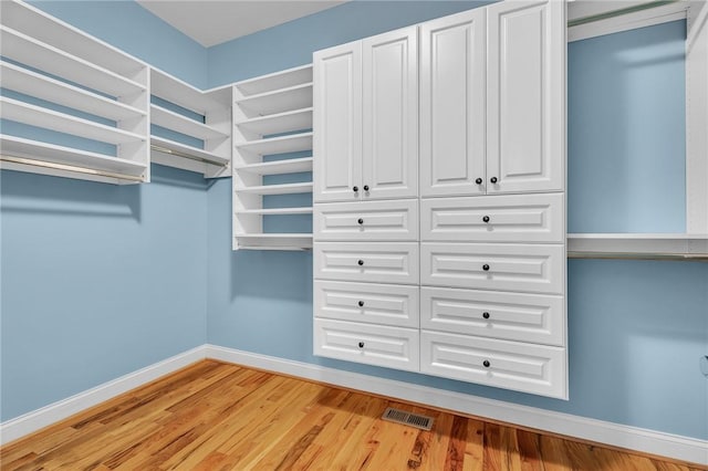 114 Royal Troon, Campobello, SC 29322 - walk in closet featuring light wood finished floors and visible vents