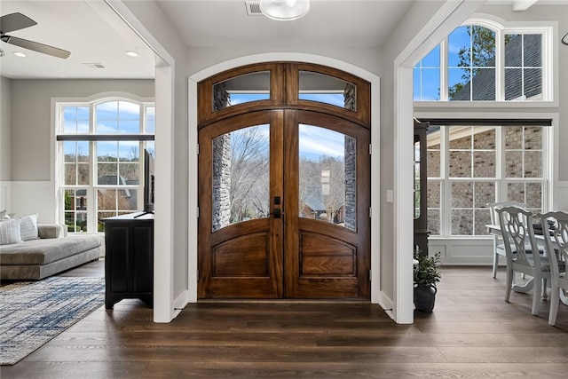 foyer with recessed lighting, visible vents, dark wood-style floors, and french doors