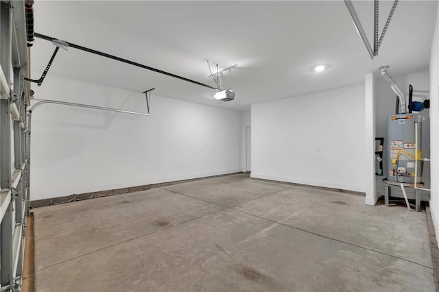 garage featuring gas water heater, a garage door opener, and baseboards