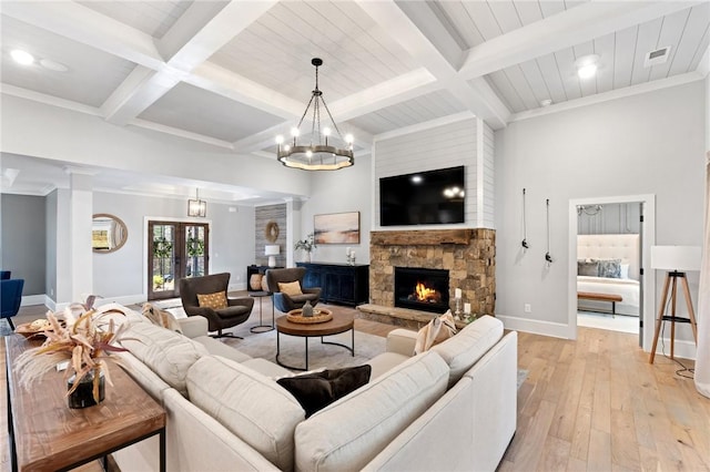 505 Bellhaven Ct, Salem, SC 29676 - living area with visible vents, baseboards, light wood-type flooring, beam ceiling, and a fireplace