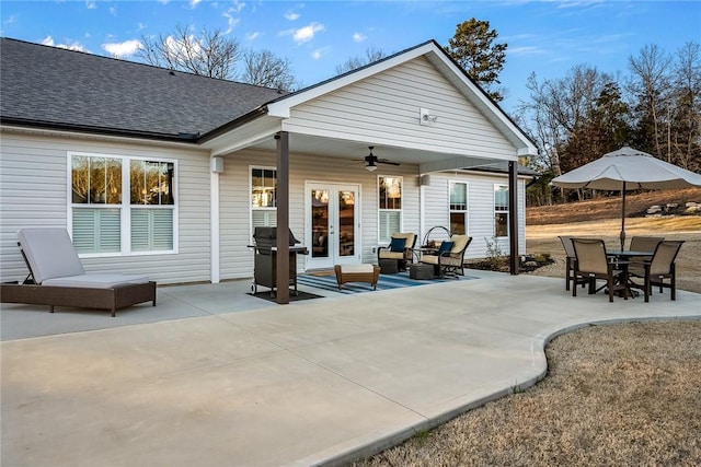 view of patio with a ceiling fan, french doors, and grilling area