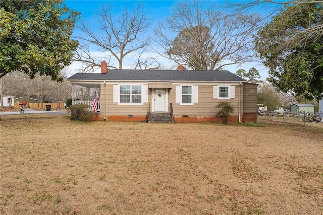 single story home with a carport, fence, a front lawn, and crawl space