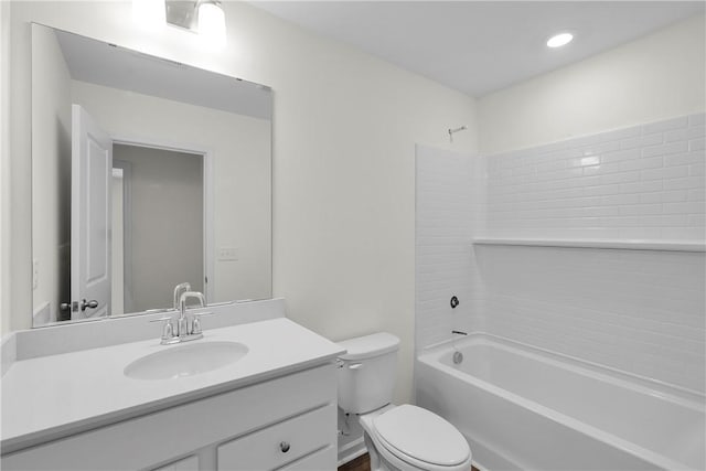 bathroom featuring vanity,  shower combination, and toilet