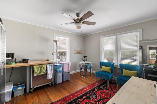 office area with plenty of natural light, a ceiling fan, wood finished floors, and crown molding