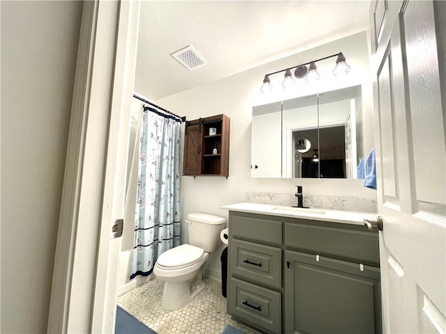 bathroom with visible vents, toilet, shower / tub combo with curtain, tile patterned flooring, and vanity