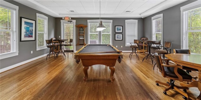 rec room with billiards, wood finished floors, baseboards, and a drop ceiling