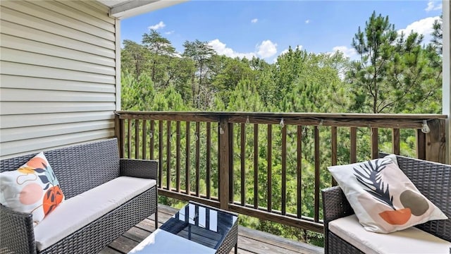 view of wooden balcony with a deck