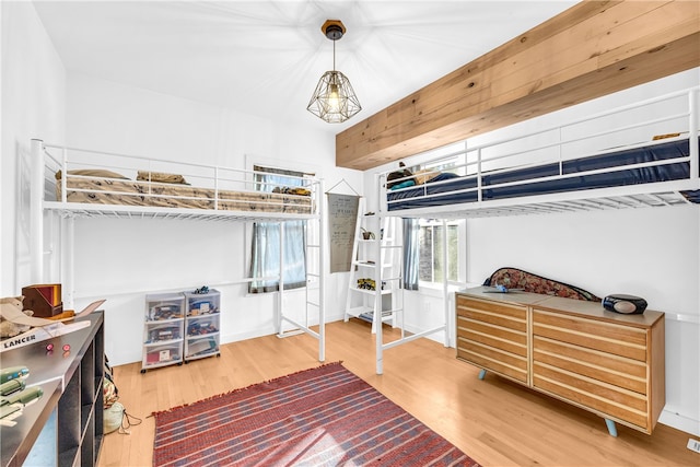 bedroom featuring wood finished floors