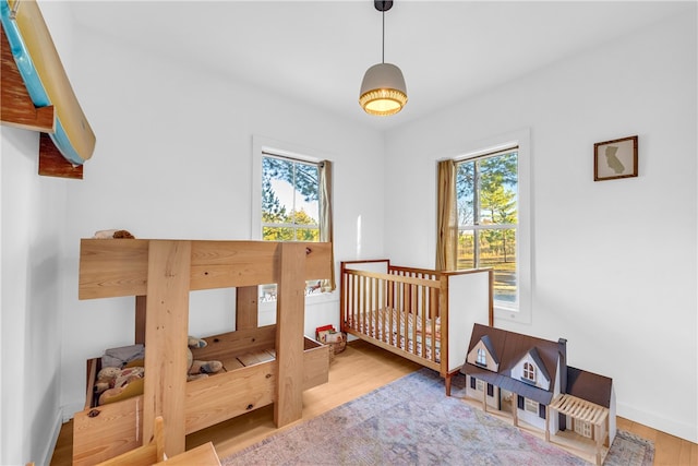 bedroom featuring wood finished floors