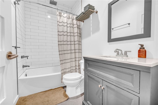 bathroom with visible vents, vanity, toilet, and shower / tub combo with curtain