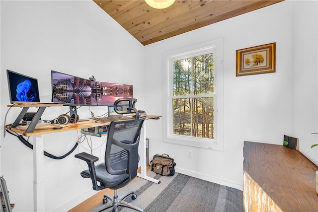 office area with wooden ceiling, baseboards, and vaulted ceiling