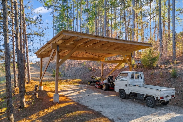 view of car parking with a carport and driveway