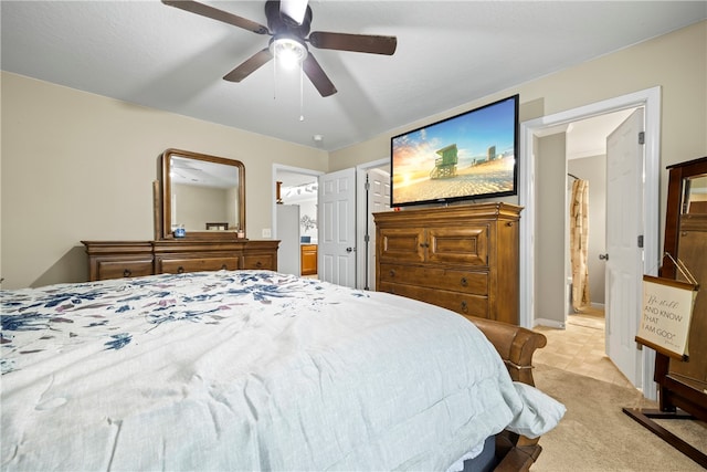 bedroom featuring a ceiling fan and light carpet