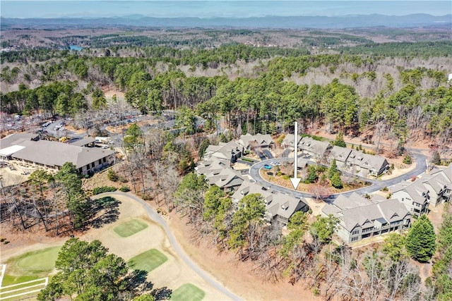 aerial view with a wooded view