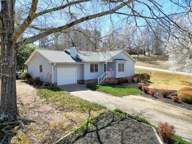 ranch-style house featuring driveway, a shingled roof, a chimney, a garage, and crawl space