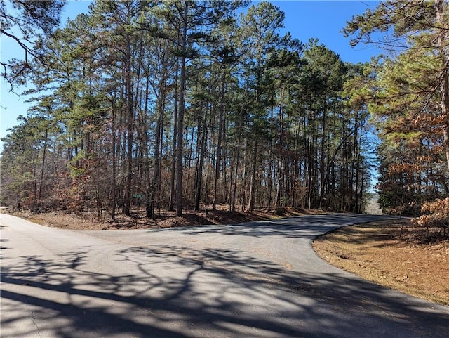 view of street featuring a view of trees