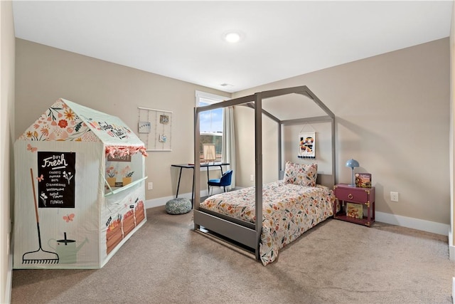 bedroom featuring carpet flooring and baseboards