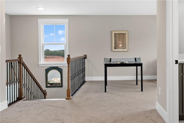 interior space featuring baseboards