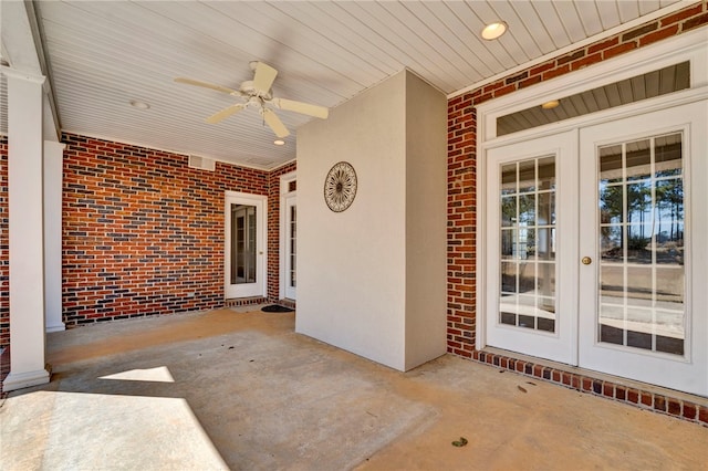 view of patio featuring a ceiling fan and french doors