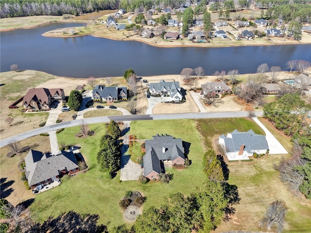 aerial view featuring a residential view and a water view