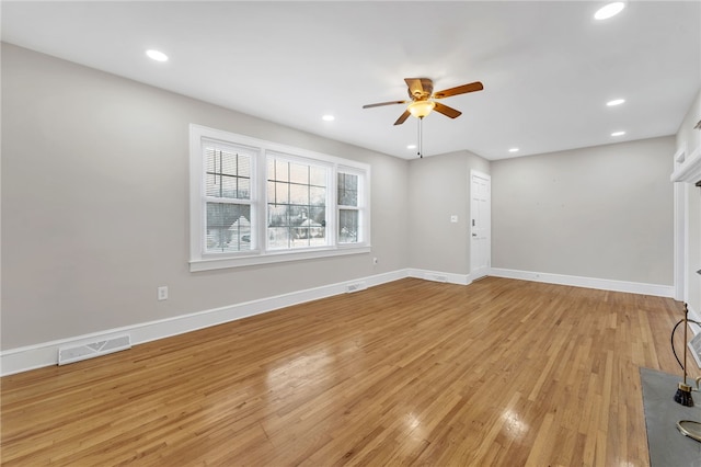 unfurnished living room featuring recessed lighting, baseboards, visible vents, and light wood finished floors