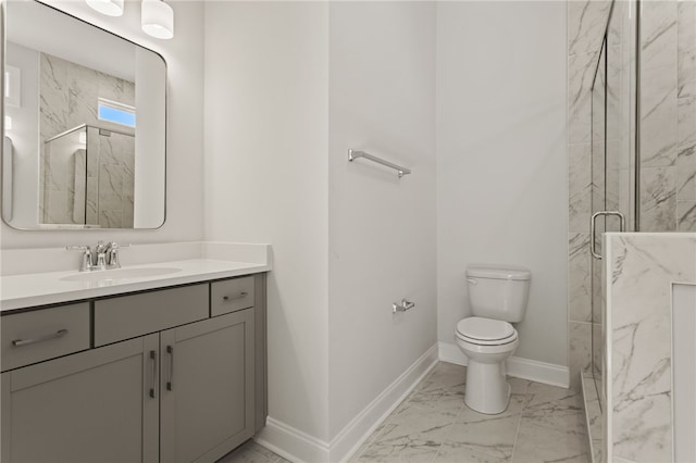 bathroom with vanity, baseboards, a marble finish shower, toilet, and marble finish floor