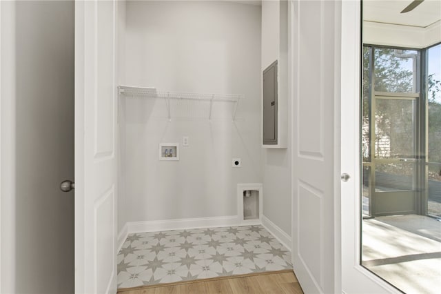 laundry room featuring hookup for a washing machine, light floors, laundry area, electric panel, and electric dryer hookup