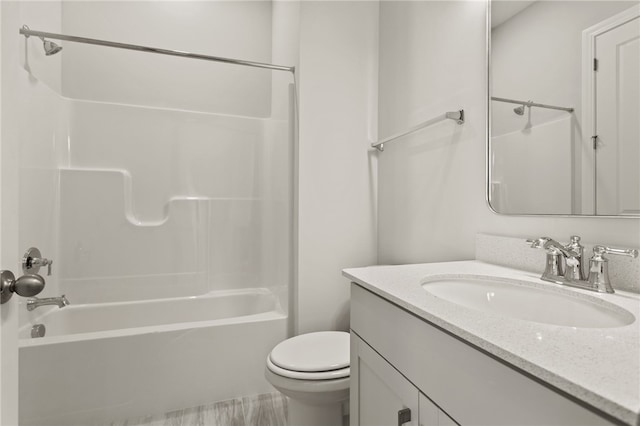 full bath with vanity, toilet, and shower / bathtub combination