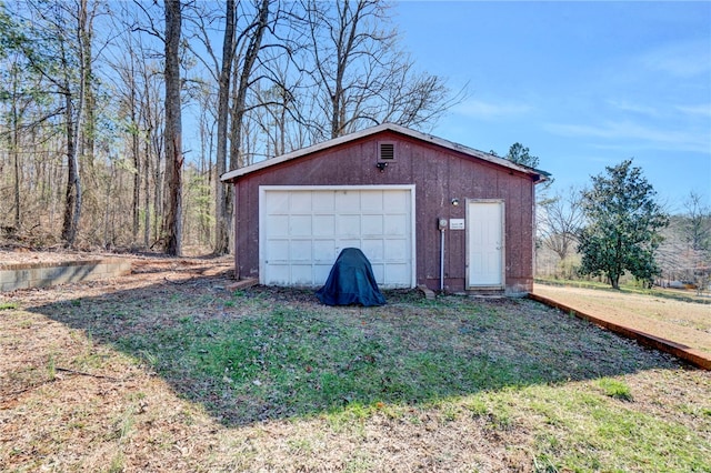 detached garage with driveway