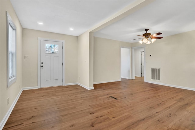 foyer featuring visible vents, ceiling fan, baseboards, recessed lighting, and wood finished floors