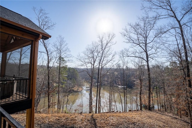 water view with a wooded view