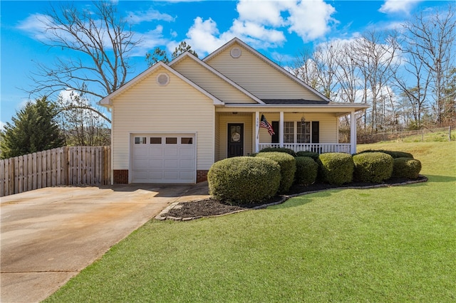 view of front of house with a front yard, fence, driveway, a porch, and an attached garage