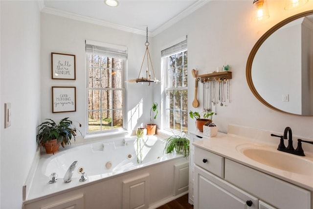 full bath featuring a wealth of natural light, vanity, and crown molding