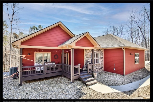 160 Julie Way, Pickens, SC 29671 - view of front of house featuring a porch, central air condition unit, stone siding, and roof with shingles