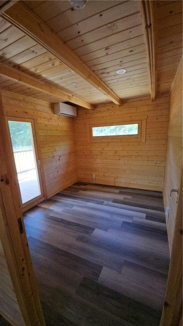 unfurnished room with beam ceiling, wooden walls, wooden ceiling, and a wall mounted air conditioner