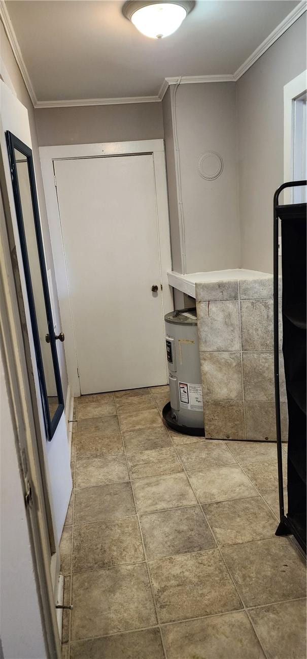 interior space featuring crown molding and water heater