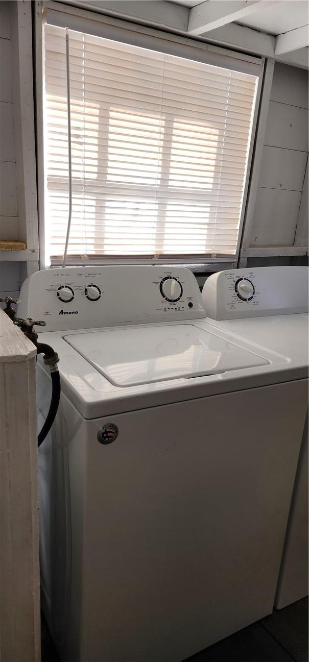 washroom with hookup for a washing machine and laundry area