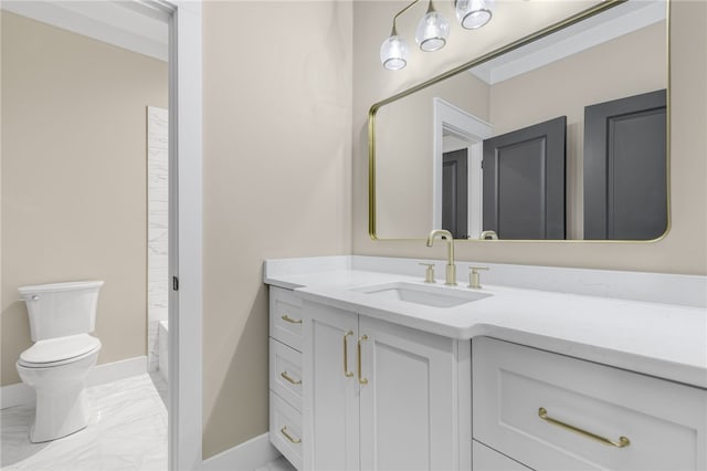 full bathroom with vanity, toilet, baseboards, and marble finish floor