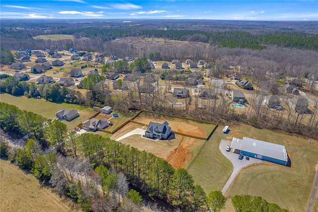 drone / aerial view with a forest view