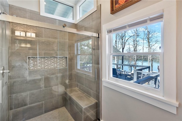 full bathroom with tiled shower