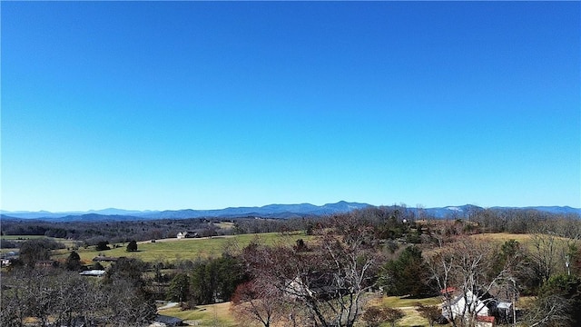 view of mountain feature featuring a rural view