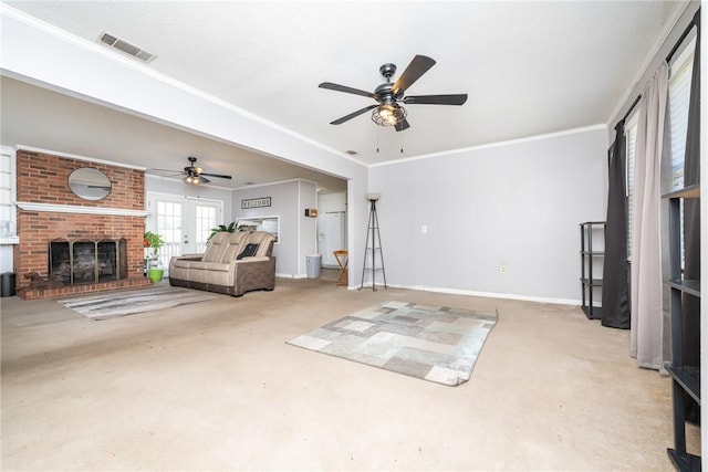 unfurnished living room featuring a fireplace, crown molding, a ceiling fan, and visible vents