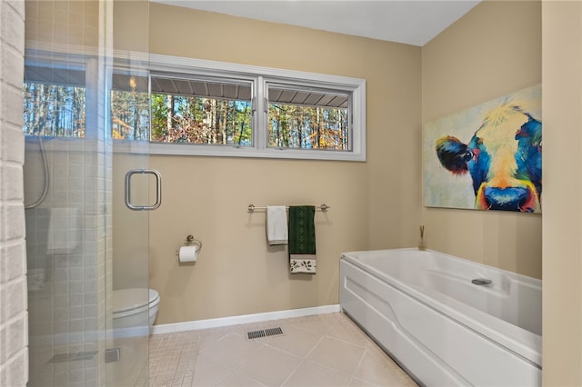 bathroom with a garden tub, baseboards, visible vents, a stall shower, and tile patterned floors